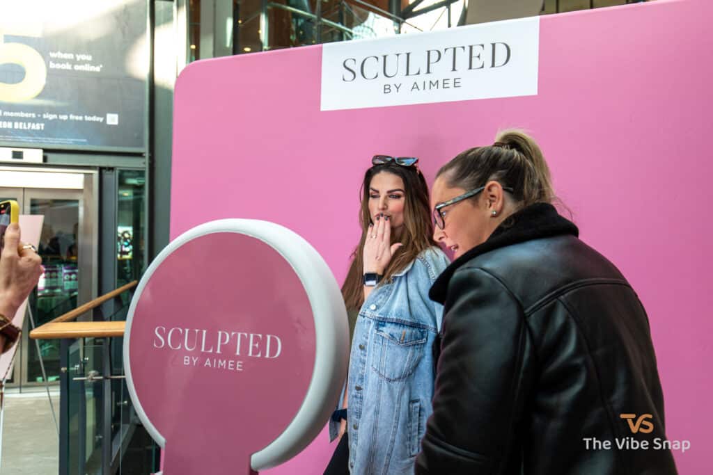 The Mobi Aura booth set up at a corporate event taking photos of guests