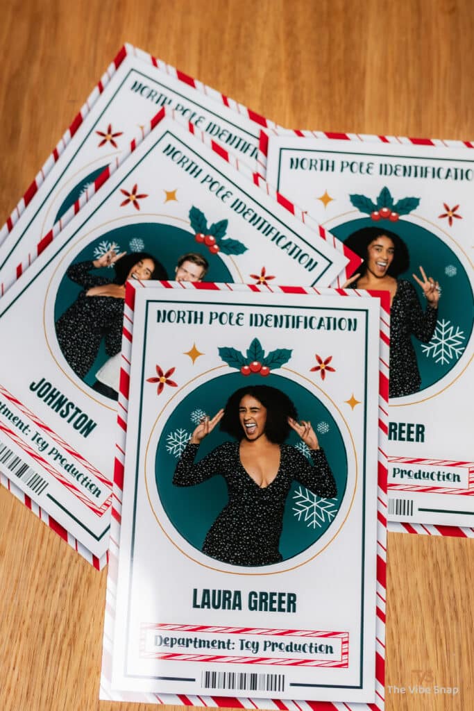 Santas Workshop ID 4x6 printed photos on wooden desk