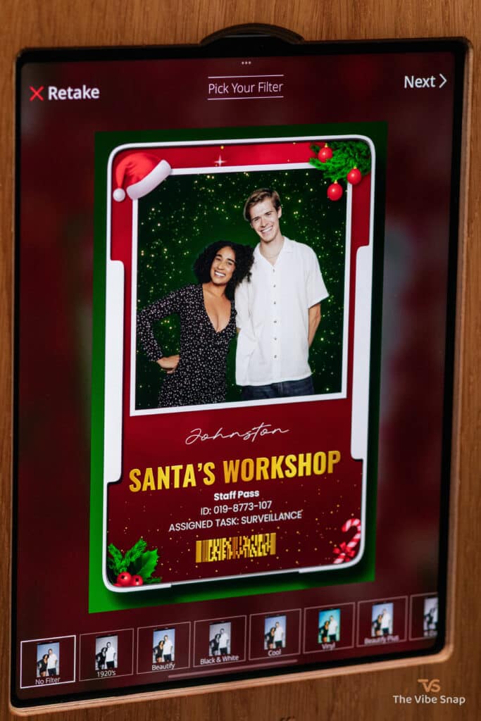 A photo of young couple in Santas Workshop ID overlay