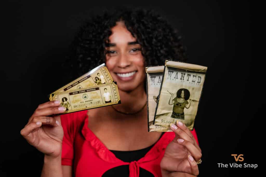 The Wild West Experience - A young woman holding printed wanted poster and train ticket 4x6 prints