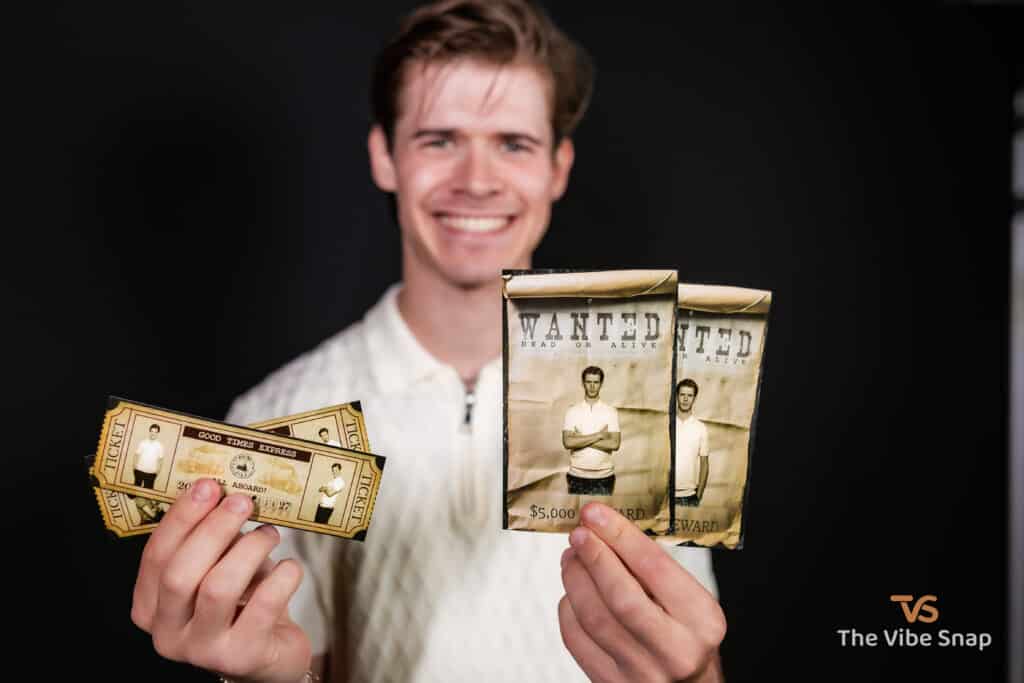 The Wild West Experience - A young man holding printed wanted poster and train ticket 4x6 prints