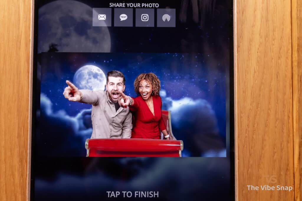 Video playing on Everybooth Icon showing two people in movie trailer