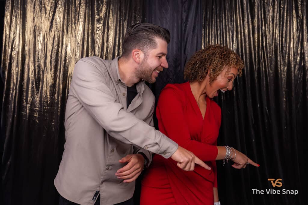 Male & female posing while looking down