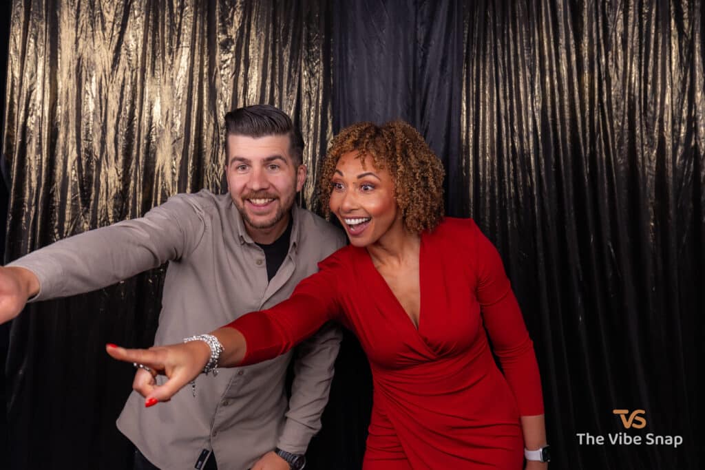 Male & female posing while smiling
