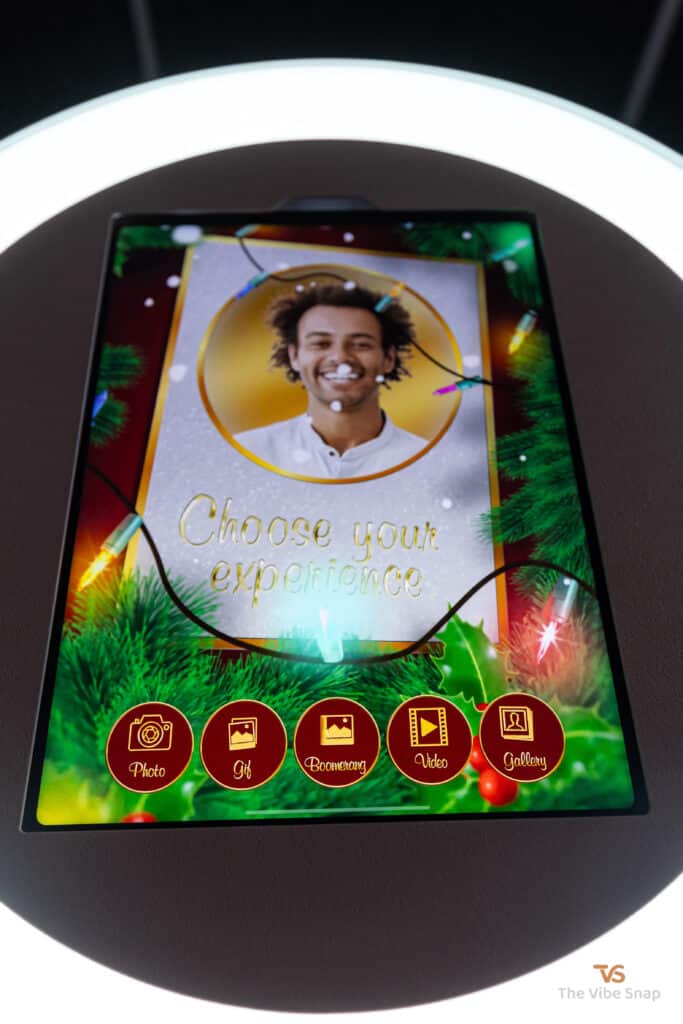 Ipad booth with holiday greeting card start screen