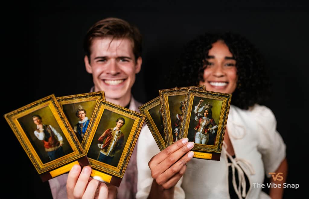 Royal AI Portrait - Couple holding printed Royal AI photos