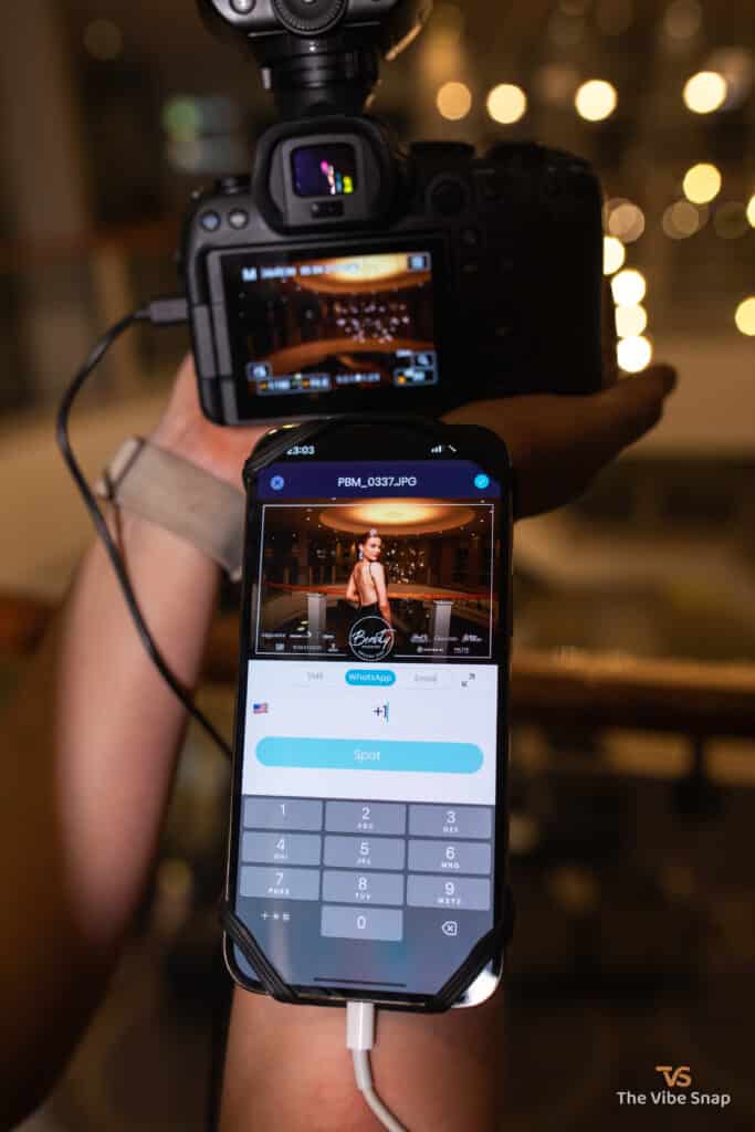 Professional headshot photo of the lady on the phone with options to share this image.